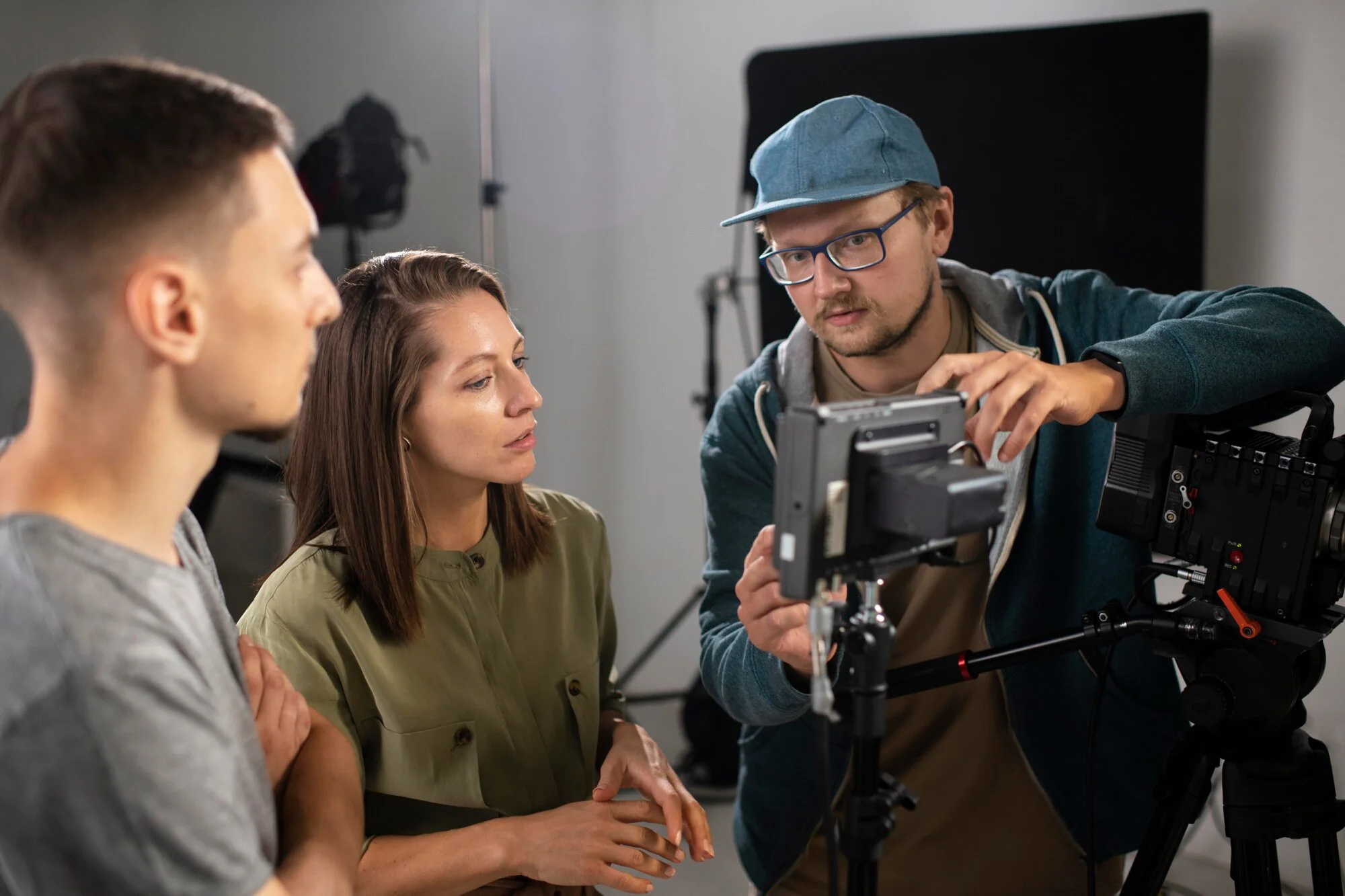 man-filming-with-professional-camera_23-2149066342