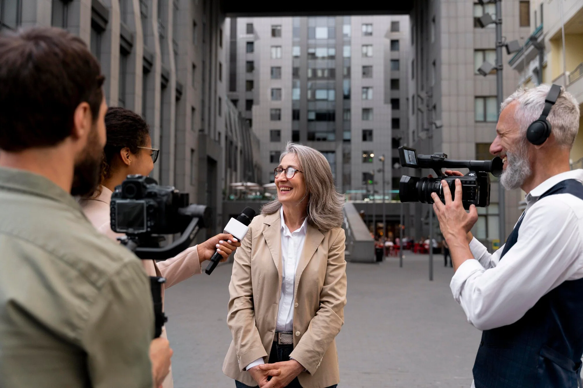 woman-being-interviewed-outdoors_23-2149032422